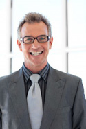Smiling Man with Glasses